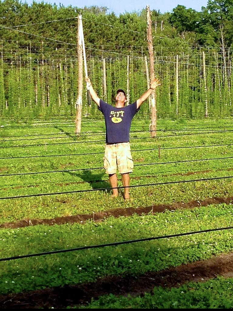 Tim Wilson in his hopyard